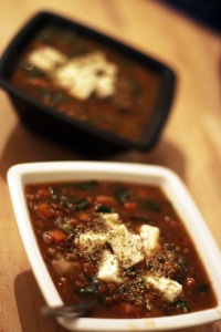 Slow Cooker Greek Lentil Soup, with creamy feta topping.